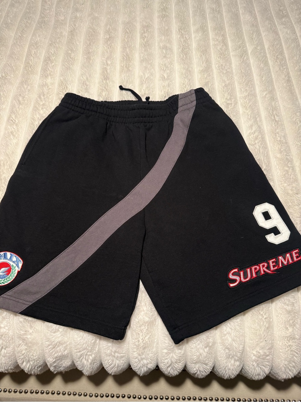 Supreme Black Athletic Shorts with Grey Diagonal Stripe and White '9'